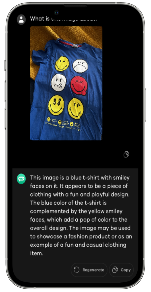 Odpowiedź aplikacji wykorzystującej ChatGPT, która była w stanie ze zdjęcia rozpoznać atrybuty koszulki takie jak kolor i elementy graficzne znajdujące się na niej